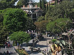 New Orleans Square (the Haunted Mansion in the background and Fantasmic! viewing area in the foreground in 2010)
