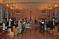 The Chapter Room at Holy Spirit Monastery. Usually the monks meet together in this room for daily religious instruction and meditation but this photo shows a ceremony with the abbot and guests.