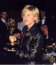 A photograph of Ellen DeGeneres with her 1997 Emmy Award.