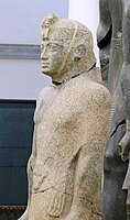 Senkamanisken, wearing the skin of a feline over his torso, Kerma Museum