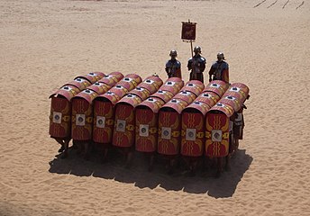 The testudo formation in a Roman military reenactment