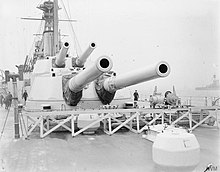 Two metal structures, each with two large gun barrels protruding from their fronts