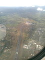Nadi International Airport, built as Nadi Airfield and Naval Air Facility Nandi. Part of Port of Nadi is seen on the left.