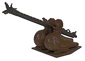 Bronze cannon with breech block and wooden garudas