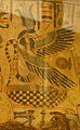 Wadjet painted on a coffin wearing the Atef crown