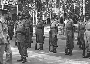 General Leclerc reviews troops of 20th Division in Saigon