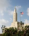 The Los Angeles Temple spire with United States flag