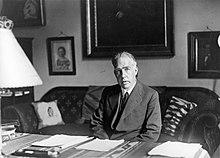 Bohr sitting at his desk