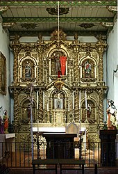 The "Golden Altar", an early Baroque-style retablo (altarpiece) situated at the north-end sanctuary of "Father Serra's Church".