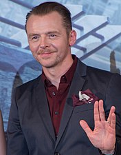 Star Trek actor and writer Simon Pegg giving a Vulcan greeting in 2016.