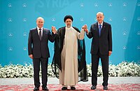 Raisi with Russian president Vladimir Putin and Turkish president Recep Tayyip Erdoğan at the Iran–Russia–Turkey summit in Tehran, July 2022