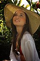 Young Woman wearing contemporary Western-style Sun Hat