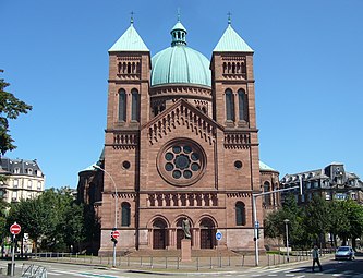 The façade of Catholic church of Saint-Pierre-le-Jeune, Strasbourg (built 1888–1893), is of a type adopted for many churches in the early 20th century.
