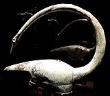 Casque in the shape of the head of a bird, found at Tintignac