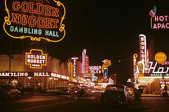 Fremont Street (1952), night view directed west; prominent neon signs include the Golden Nugget and Vegas Vic