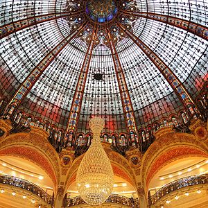 The art-nouveau cupola of Galeries Lafayette (1912) provides natural light to the levels around the courtyard below.
