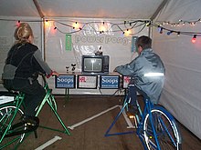 hackers playing a bicycle-powered video game