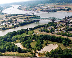 Point Pleasant (foreground) at the confluence of the Kanawha and Ohio Rivers. Gallipolis, Ohio is in the background right while Henderson, West Virginia is on the left.