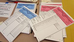 Republican and Democratic party ballots in a Massachusetts polling location, 2016