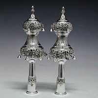 Finials used to decorate the top ends of the rollers of a Torah scroll