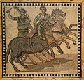 Victorious charioteer holding a palm branch on a Roman mosaic