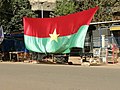 Burkinabé flag hanging on the side of a road in Ouagadougou (2022)