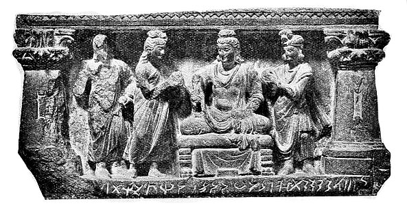 Piedestal of the Hashtnagar Buddha statue, now in the British Museum, inscribed with "year 384" (probably of the Yavana era), hence 209 CE.[9] The inscription reads in the Kharoshthi script: sam 1 1 1 100 20 20 20 20 4 Prothavadasa masasa divasammi pamcami 4 1 ("In the year 384, on the fifth, 5, day of the month Prausthapada").[14] The pedestal was sawed off from the body of the statue by L. White King in 1883 and brought to the British Museum.[15] British Museum