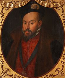 Miniature portrait of the Earl of Warwick, richly dressed in a slashed doublet with the Order of the Garter on a ribbon round his neck. He is a handsome man with dark eyes and dark goatee beard.