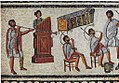 Image 27Musicians playing a Roman tuba, a water organ (hydraulis), and a pair of cornua, detail from the Zliten mosaic, 2nd century AD (from Culture of ancient Rome)