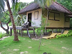 A modern resort guesthouse in Busuanga, Palawan with plain diagonally-woven sawali walls