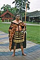 Maori man wearing a korowai and piupiu