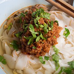 Khao soi nam na is a style of khao soi with a minced pork-and-chilli paste, that is eaten in the eastern part of Chiang Rai Province, Thailand.