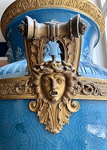 Neoclassical Medusa mascaron on a handle of the Mayeux Vase, by the Sèvres Porcelain Manufactory, 1878, hard-paste porcelain, gilded copper molding on the collar, and gilded bronze handles, Louvre