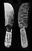 Prehistoric knife, Naqada II period, Petrie Museum UC 16294.[63] The "snake twist around rosette" is another Mesopotamian motif.[39][62]