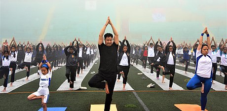 The Indian Minister of State for Home Affairs, Kiren Rijiju, in a public yoga session on the 3rd International Day of Yoga in Gangtok, Sikkim, 21 June 2017