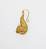 Earring in the form of a dolphin; 5th century BC; gold; 2.1 by 1.4 by 4.9 centimetres (0.83 in × 0.55 in × 1.93 in); Metropolitan Museum of Art