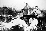 Burning synagogue in Eisenach during Kristallnacht, 9 November 1938.