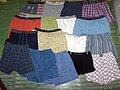 Several pairs of boxer briefs compared with loose boxer shorts.