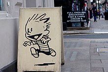 "Calvin runs through the streets of London" temporary illustration outside former location of Gosh Comics, Great Russell Street, London
