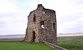 The eastern three-storey corner tower in the inner ward with the Dee Estuary beyond.