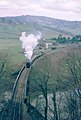 A steam-hauled stone train crossing the River Wye after departing from Tintern railway station in 1963