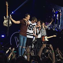 The Vamps performing at the O2 Arena in London during their Wake Up World Tour, in April 2016. (L-R: James Brittain-McVey, Tristan Evans, Connor Ball and Brad Simpson)