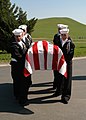The Ceremonial Unit assigned to Naval Air Station Lemoore rendering honors at a military funeral at San Joaquin Valley National Cemetery in Gustine, California.