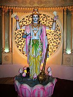 Modern murti of Vishnu, with halo created by lighting