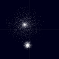 Particle distribution resembling two neighboring galaxies.
