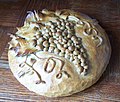 The decorated bread is a gift for the Catholic Church from children who had their first Communion in Poland.