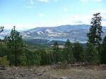 Colville National Forest with a lake and mountains.