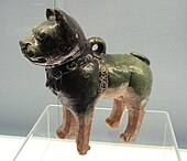 Glazed pottery dog, with collar patterned onto the surface; Eastern Han, 1st century CE.