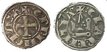 Two sides of a small coin, one of them depicting a cross