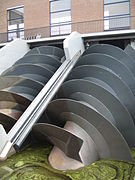 Modern Archimedes' screws which have replaced some of the windmills used to drain the polders at Kinderdijk in the Netherlands